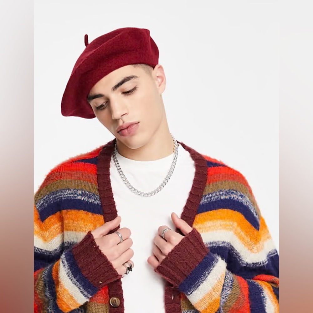 Never worn in packaging red beret! One sized.